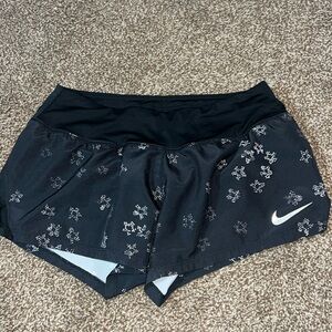 Black Nike running shorts